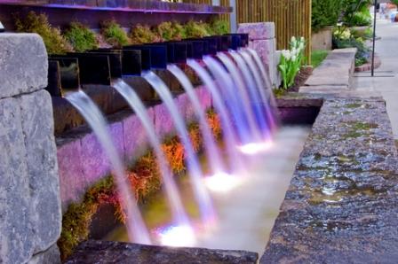 colorful garden water fountain as a focal point